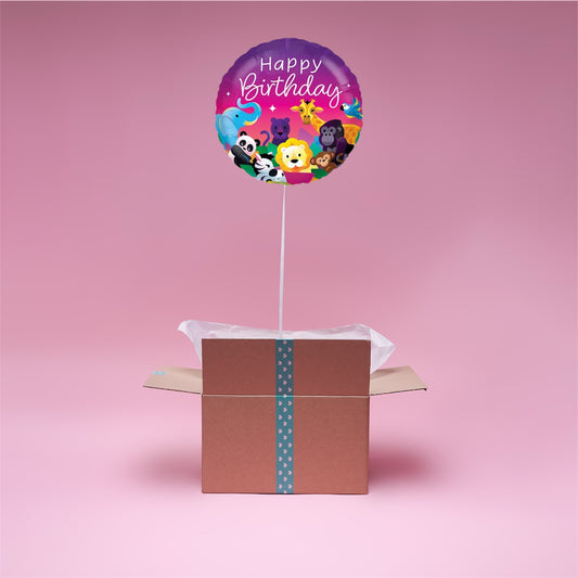 Ballon violet Happy Birthday avec animaux de la jungle flottant dans une box cadeau ouverte, message personnalisé inclus.