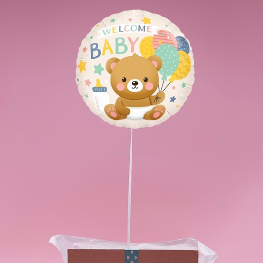 Zoom sur le ballon Welcome Baby décoré d’un ourson, cadeau naissance livré en box surprise.