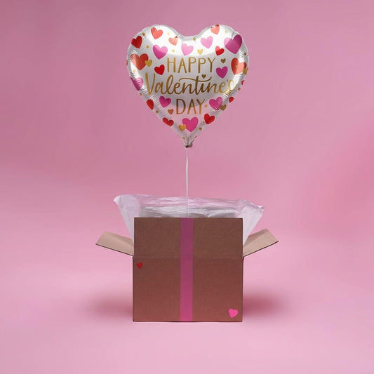 Ballon cœur rouge qui s’envole à l’ouverture du colis – Cadeau surprise Saint-Valentin original