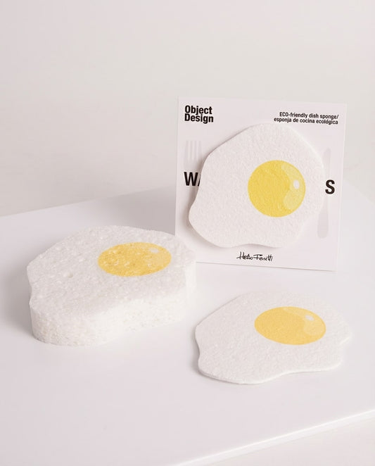 Lot de deux éponges design œuf au plat sur fond blanc