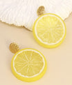 Boucles citron fun et légères portées – accessoire pop pour look d’été