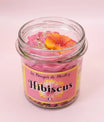 Bougie artisanale Hibiscus 100g fond rose